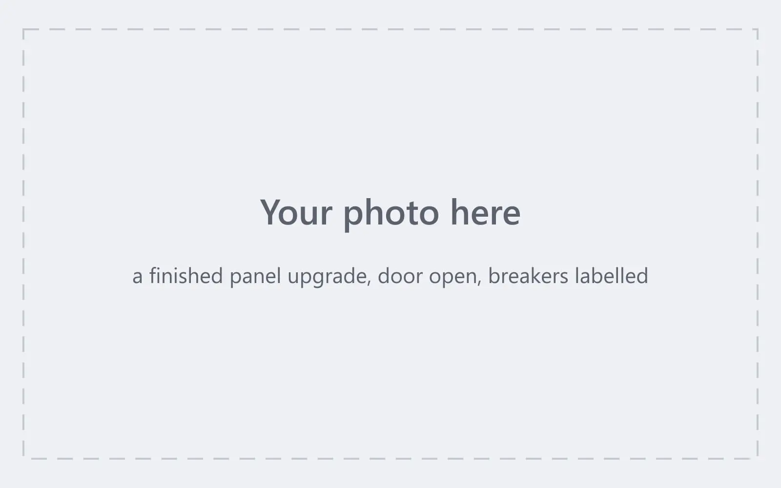 Empty slot marked for a photograph of a finished panel upgrade with the door open and the breakers labelled